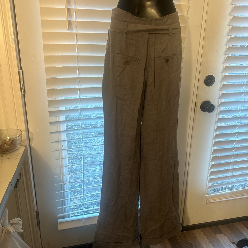 Gray and linen wide leg pants with belt, pockets on the front and back.